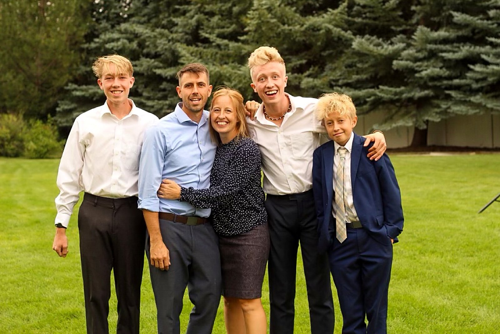 Alex Hart with his wife Elise and their three sons